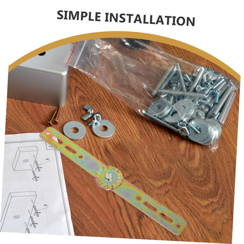 Installation kit for heavy-duty adjustable hinge with screws and washers on a wooden surface.