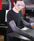 Heavy Duty Industrial Cut Resistant Safety Sleeves With Intercept Knit Wide Thumbslot Seamless Grey Build for arm protection in a workshop.