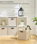 Storage Cube Bins For Shelves And Closets Beige Fabric Cubby Organizer Baskets Three Size Options 11 In 13 In And 13x15x13 In 4 Pack in white shelving unit