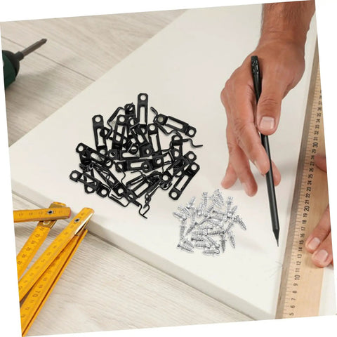 Dead Simple 30 Piece Heavy Duty Metal Furniture Joint Snap Connectors For Sofa Cabinet Assembly No Sweat Tool Free Setup For Smooth Diy Wood Fix Projects on a work table with screws and a measuring ruler.