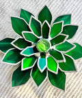 Close-up of a green stained glass succulent with five to six petal design for Four Layer Stained Glass Succulent Soldering Jig Kit.