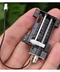 Tiny 6mm Precision Planetary Stepper Motor in hand, showing 30mm stroke, micro 2 phase 4 wire for 3D printing and medical devices.
