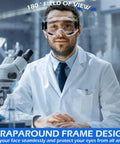 Man wearing Six Pack Anti-Fog Safety Goggles For Men And Women, ANSI Z87.1 Protective Lab Glasses, in a lab setting