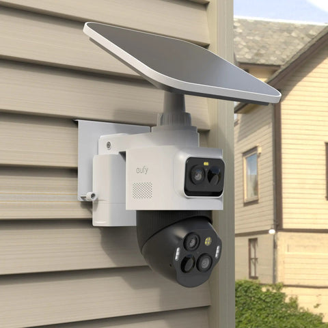 Slick No Drill Vinyl Siding Mount Clip For Eufycam S4 Security Camera mounted on vinyl siding, featuring a solar panel and dual lenses.