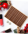 Totally Game Changing Wood Jewelry Tray With Plush Suede Grid Organization Board featuring 40 dedicated spaces for rings and trinkets.
