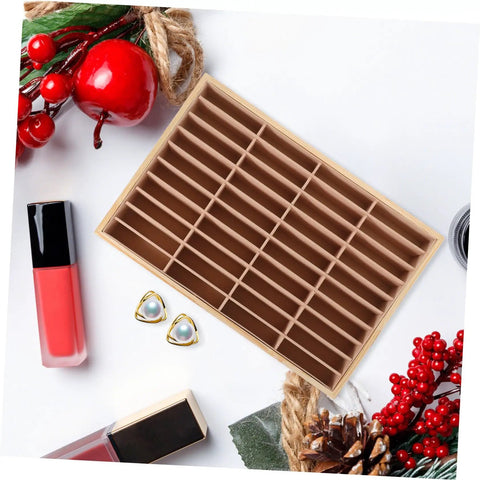 Totally Game Changing Wood Jewelry Tray With Plush Suede Grid Organization Board featuring 40 dedicated spaces for rings and trinkets.