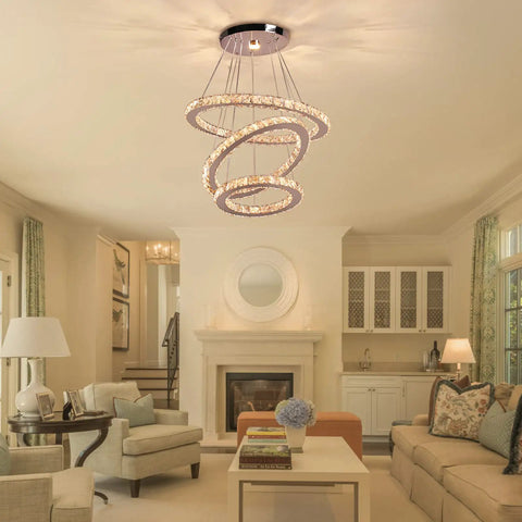 Dope Modern Crystal Ring Chandeliers LED Pendant Light With Adjustable Height in living room setting