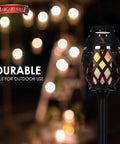 Front view of Waterproof Tiki Torch Bluetooth Speaker Two Pack Portable Party Speaker With Flickering LED Lights Perfect For Travel Backyard Parties Poolside And More, showing durable pole for outdoor use.