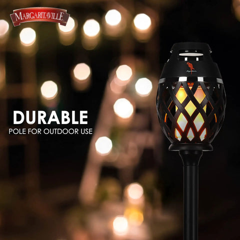 Front view of Waterproof Tiki Torch Bluetooth Speaker Two Pack Portable Party Speaker With Flickering LED Lights Perfect For Travel Backyard Parties Poolside And More, showing durable pole for outdoor use.