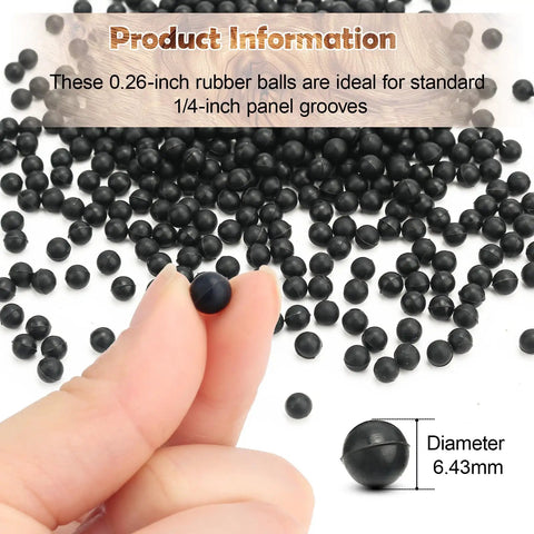 Raised Panel Cabinet Door Spacers 500 Pack Quarter Inch Black Rubber Ball Bumpers shown being held with other balls in background.