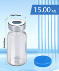 Front view of a 15 ml clear glass vial with a metal crimp cap and a blue cap beside it; sterile empty.