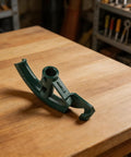 Sileduove Manual Pipe Bender For 3/4 Inch Tubes With Interchangeable Dies For Copper And Steel, compact green steel tool on wooden surface.