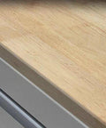 Built Like A Tank Steel Tool Cabinet With Multiple Lockable Drawers For Heavy Duty Garage Setups And Rust Resistant Workshop Storage close-up of natural wood top surface.