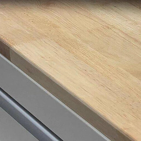 Built Like A Tank Steel Tool Cabinet With Multiple Lockable Drawers For Heavy Duty Garage Setups And Rust Resistant Workshop Storage close-up of natural wood top surface.