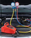 4.2 Cfm Pneumatic Vacuum Pump Air Operated Evacuation Tool For Automotive Air Conditioner Systems with gauges and hoses on engine bay.