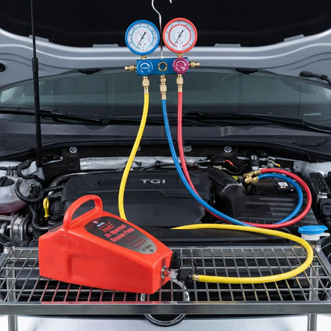 4.2 Cfm Pneumatic Vacuum Pump Air Operated Evacuation Tool For Automotive Air Conditioner Systems with gauges and hoses on engine bay.