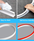 Collapsible 67 Inch Shower Threshold Water Dam Barrier for Wet Dry Separation showing cleaning ease and flexibility on gray surface.