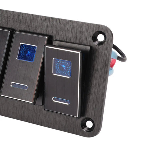 Close-up of an Eight Gang Aluminum Toggle Switch Panel for DC 12V to 24V Systems, waterproof, black finish with blue LED light