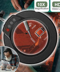 2 In 1 LED Magnifying Glass With Stand And Clamp over circuit board, showing close work with Five Color Modes Dimmable Lighting