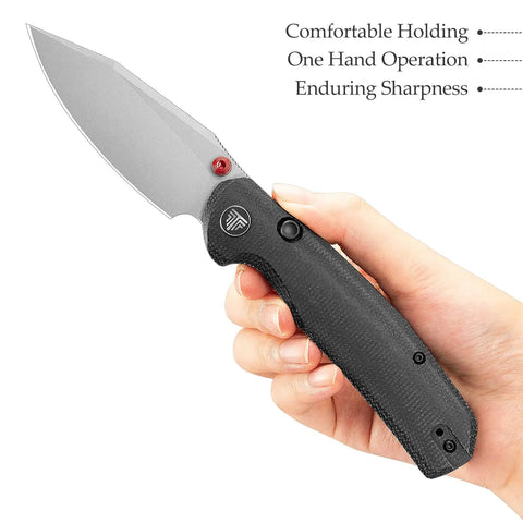 Hand holding Folding Pocket Knife With A 3.34 Inch Blade And Button Liner Lock, PVD coated steel, ergonomic design