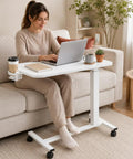Smooth Operator Mobile Rolling Desk With Lockable Casters And Pneumatic Height Adjustment From Twenty Eight To Forty One Inches perfect overbed bedside table in bright white.