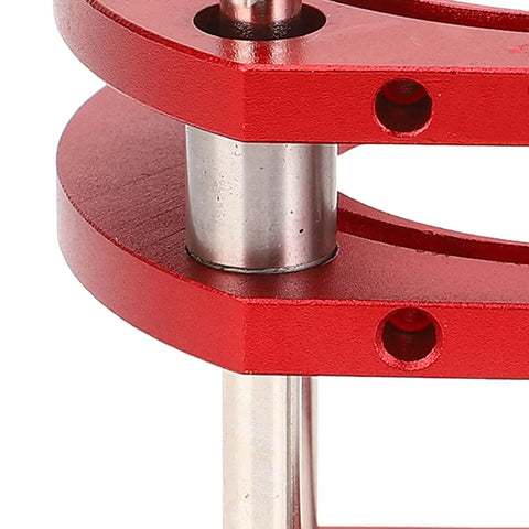 Router Lift Base For Woodworking, Durable Aluminum Alloy And Stainless Steel Build, Effortless Height Adjustment, Table Lifting System With 4 Jaw Clamps, Fits 64mm And 66mm Routers close-up of red metal base