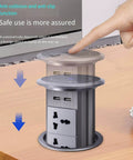 Slick Auto Rising Desk Power Strip With Fast Wireless Charger Tempered Glass Top hidden flush mount socket in use on wood desk.
