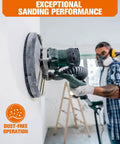 Ditch The Sanding Hassle With This Sweet 84 Piece Set Of Pro Grade 9 Inch Aluminum Oxide Discs Featuring All Seven Essential Grits From Rough To Smooth For Drywall Wood And Paint Projects That Get Your Work Done Fast and Flawless. A worker uses a 9 inch sanding tool on a wall, demonstrating dust-free performance.