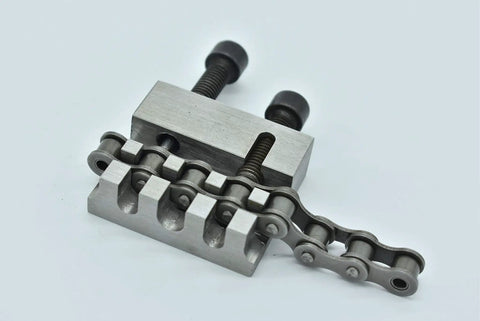 Chain Breaker And Press Tool For 415 428 420 41 40 Chains, Steel Construction, showing chain held firmly for pin removal.