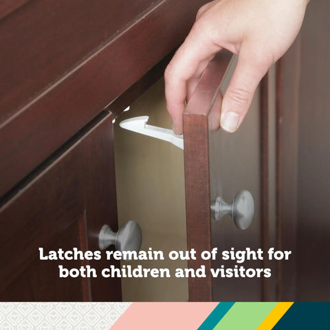 Bulletproof Spring Loaded Cabinet And Drawer Latches 10 Pack White being installed on a wooden cabinet for child safety.