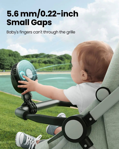 Baby sitting in stroller touching Mini Portable Stroller Fan Clip On Battery Operated Detachable 3 Speed Rechargeable 360 Degree Rotating Flexible Tripod For Car Seat Crib Travel On The Go Quiet Safe For Baby Black, highlighting small gaps for safety.