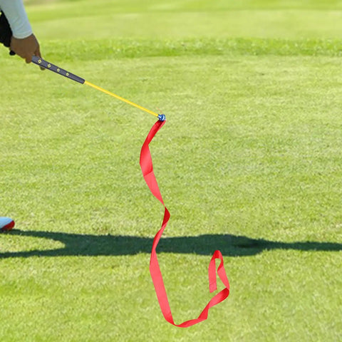 Golf Swing Trainer With Non Slip Grip And Ribbon Training For Correct Posture And Grip Warm Up Rod In Use On Lawn