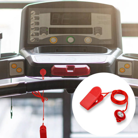 Two Pack Universal Treadmill Magnetic Safety Keys With Emergency Stop Lock clipped on a treadmill console, highlighting red key.