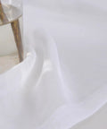 White Sheer Curtains 63 Inch Length Rod Pocket Voile Drapes close-up showing semi crinkle texture and soft polyester material.