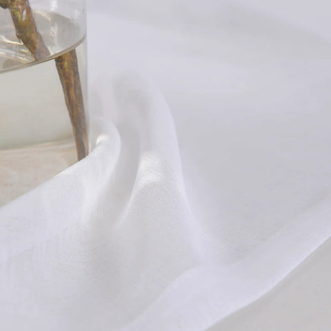 White Sheer Curtains 63 Inch Length Rod Pocket Voile Drapes close-up showing semi crinkle texture and soft polyester material.