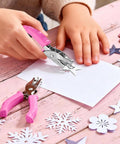 Two Pack Handheld Hole Punches With One Quarter Inch And One Eighth Inch Holes Soft Pink Grip Handy for crafts and scrapbooks on table