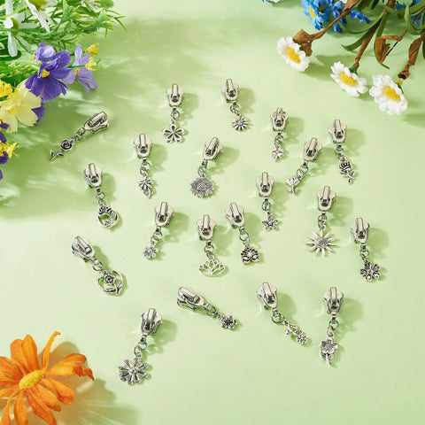 Flower Metal Zipper Pull Replacement Sliders Set 20 Pcs Durable Alloy With Platinum Finish displayed with colorful flowers