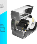 Industrial Thermal Transfer Printer With Sweet 300 Dpi Clarity And Badass Reliability For Top Shelf Label Printing Across Your Workspace showing open access for easy ribbon loading.