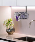 Absolute Knockout Tumbler Lid Organizer That Snaps Right Onto Standard Cups And Keeps Your Counter Dead Clean Without Any Hassle While Holding Ten Sip Lids In Chill Modern Black Design mounted under cabinet with ten lids.