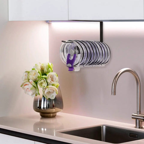 Absolute Knockout Tumbler Lid Organizer That Snaps Right Onto Standard Cups And Keeps Your Counter Dead Clean Without Any Hassle While Holding Ten Sip Lids In Chill Modern Black Design mounted under cabinet with ten lids.