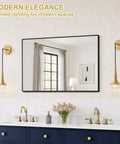 XYDikssn Gold Wall Sconce, Hardwired Wall Light with Brushed Brass and Clear Ribbed Glass Shade, modern bathroom setting.