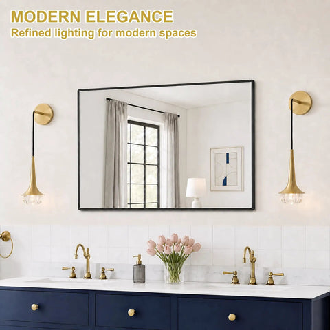 XYDikssn Gold Wall Sconce, Hardwired Wall Light with Brushed Brass and Clear Ribbed Glass Shade, modern bathroom setting.