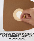 Close-up of a hand holding Replacement Dust Bags For Eureka And Sanitaire Mighty Mite Canisters MM Style 3670 3680 4100 4300 5180 Series