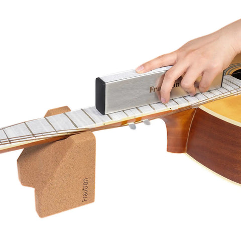 Pro Grade Guitar Setup Tool Kit For DIY Luthiers With Neck Rest Cradle, 8 Inch Fret Leveling Beam in use on acoustic guitar neck