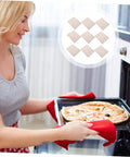 Woman using Must Have 10 Pack Mica Plate Sheets 150x120mm Heat Resistant Insulation for Microwave Ovens in kitchen