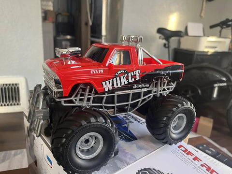 Red RC Monster Truck With Realistic Water Based Spray Mist 2.4GHz Remote Upright 360 Rotate 4WD All Terrain Off Road Toy Car