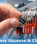 Hand holding black squeeze and pinch pegboard clip in retail display, Black Squeeze And Pinch Pegboard Clips For One Quarter Inch Pegboard And One Quarter Inch Slat Wall Hooks Pro Grade Lockdown Clips For Inventory Control That Secure Retail Hooks On Pegboard And Slat Wall Panels 100 Pack