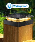 Two Pack Solar Post Cap Lights For Outdoor Fences Deck Waterproof Led Railing Caps With Adjustable Brightness on a wooden post.