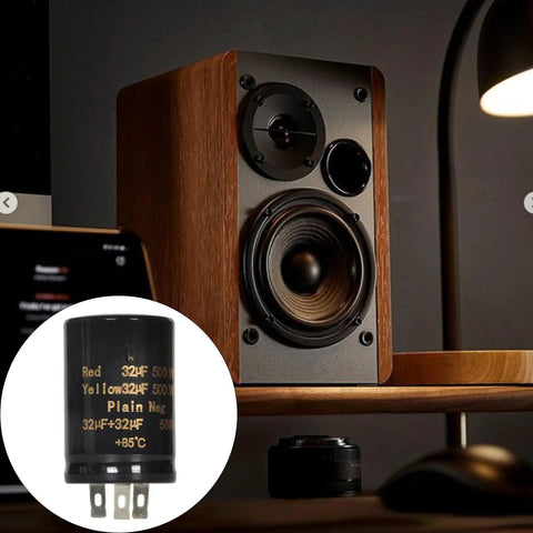Pro Grade Heavy Duty Filter Capacitor Selection Featuring 10UF Through 100UF Picks For Industrial Power Conversion And Hifi Rectification With Rock Solid 500V Ratings And Built Tough Resilience For Hands On Makers in front of a speaker.