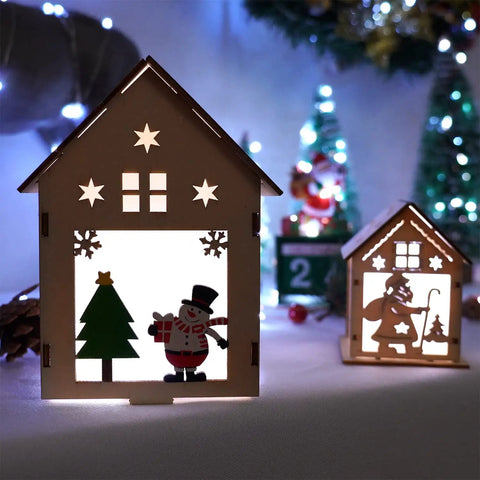 Wooden Christmas lantern with snowman and tree silhouette, surrounded by Two Pack 33 Ft 100 LED Battery Operated Fairy String Lights